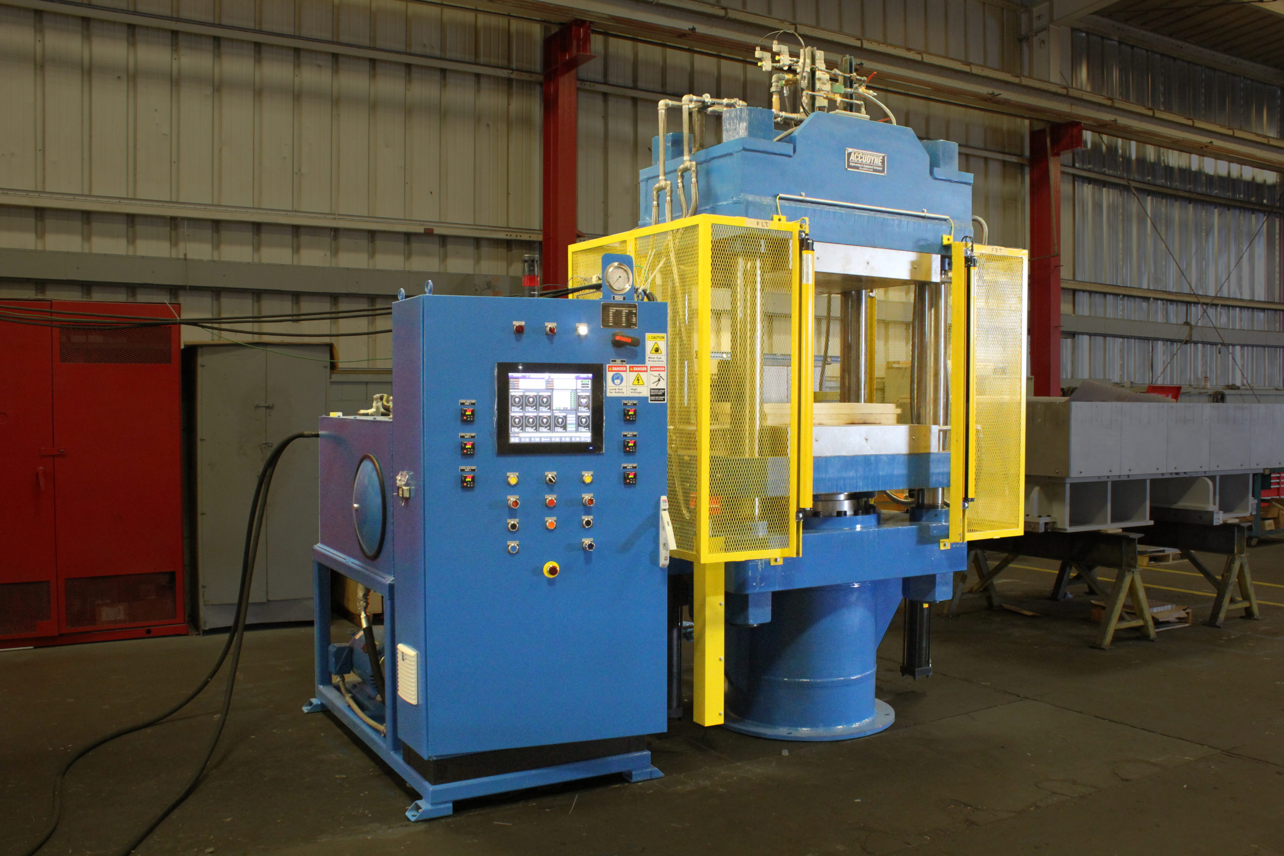 Polypress Machine Shipped: New 600 Ton Composite-Polymer Press System - Accudyne